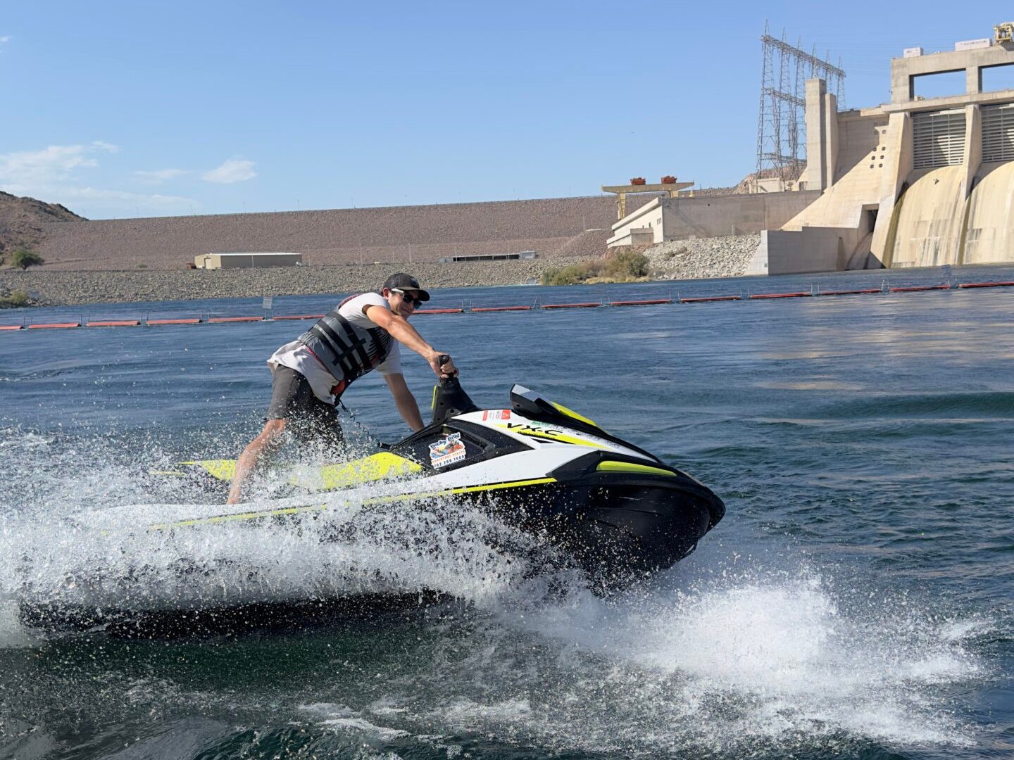 a man riding a wave on a surfboard in the water